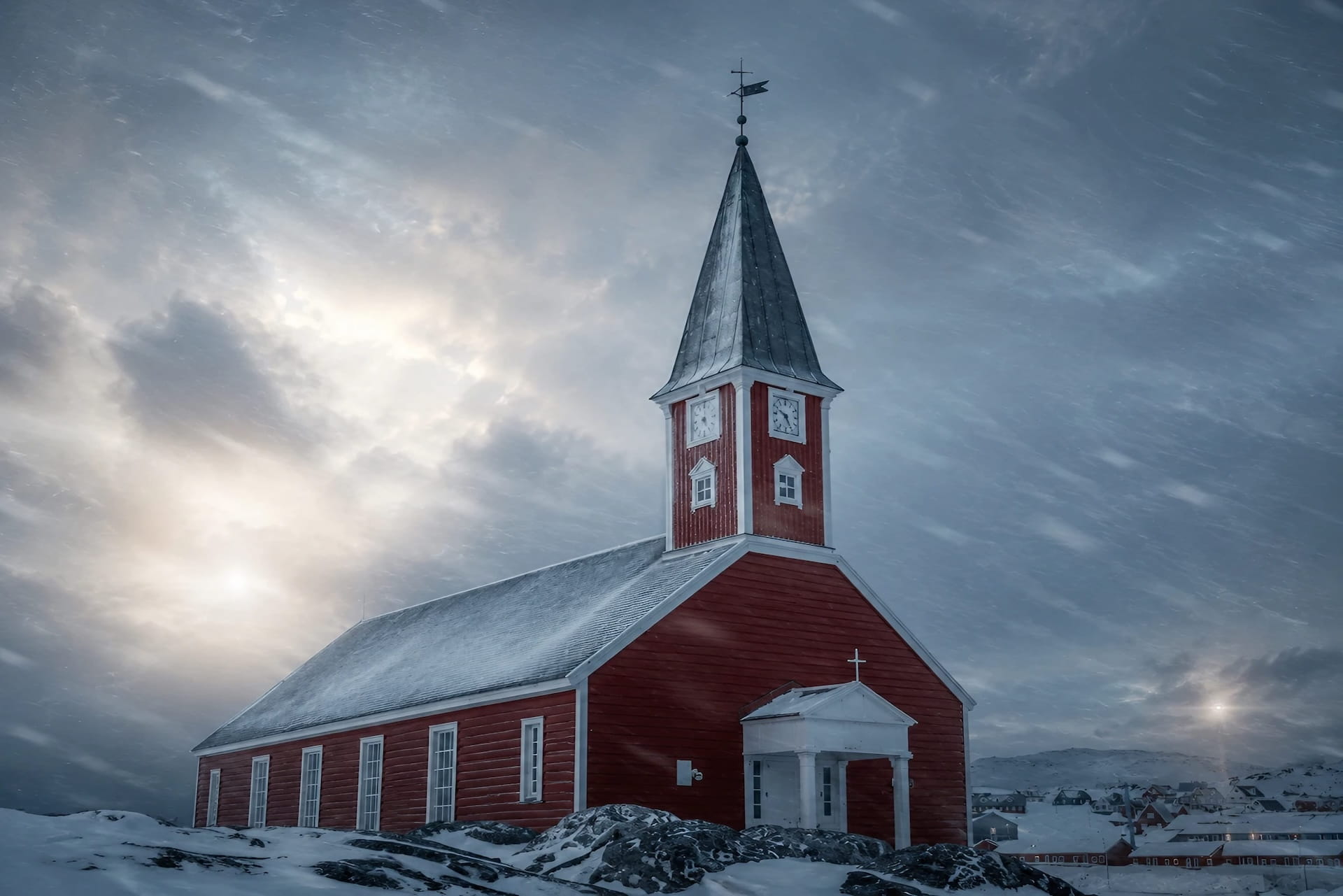 Nuuk Cathedral in a snowstorm, a landmark stop on the Nuuk City Tour