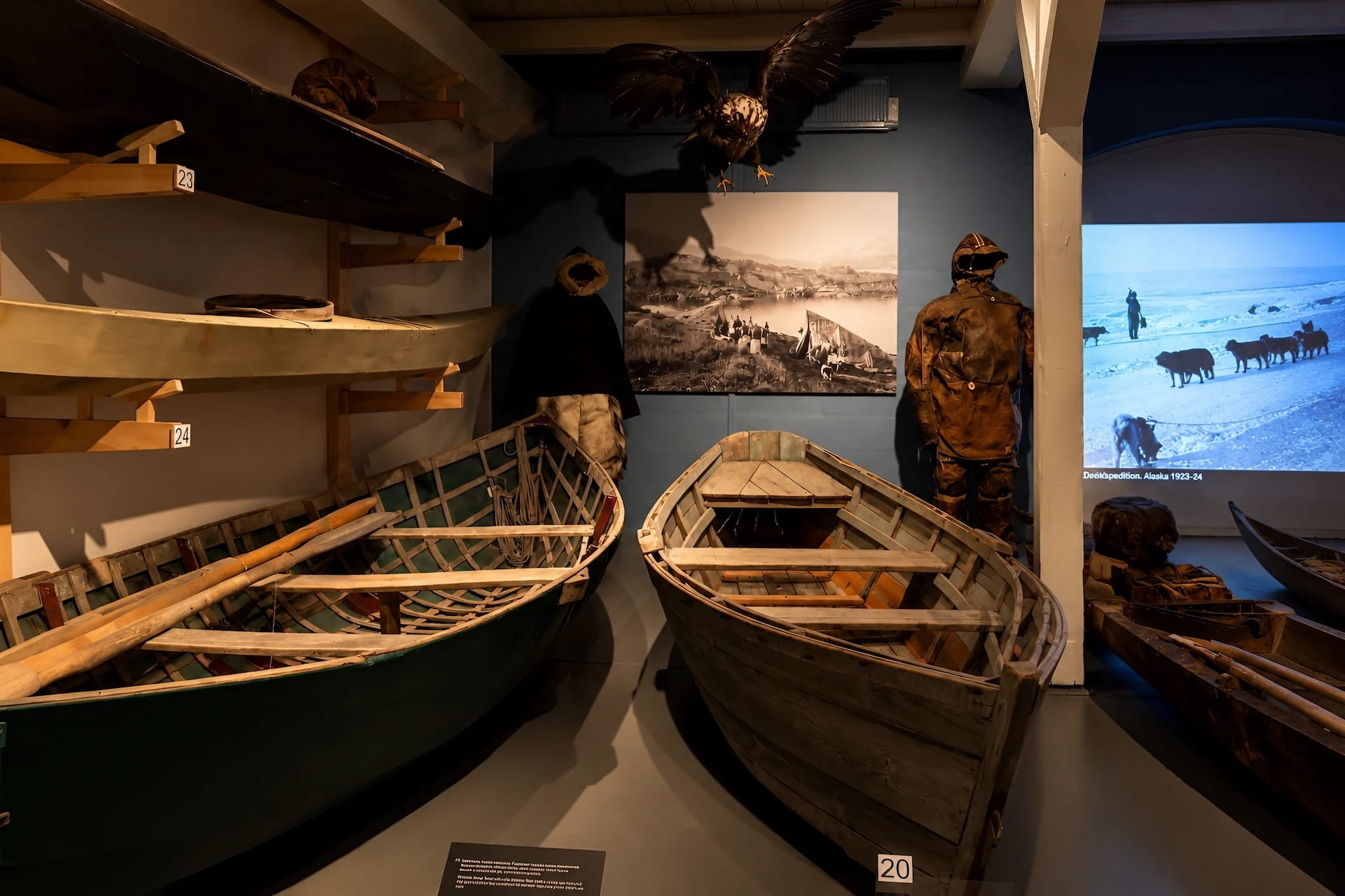 Greenland National Museum interior with traditional skin boats, visited on the Nuuk City Tour